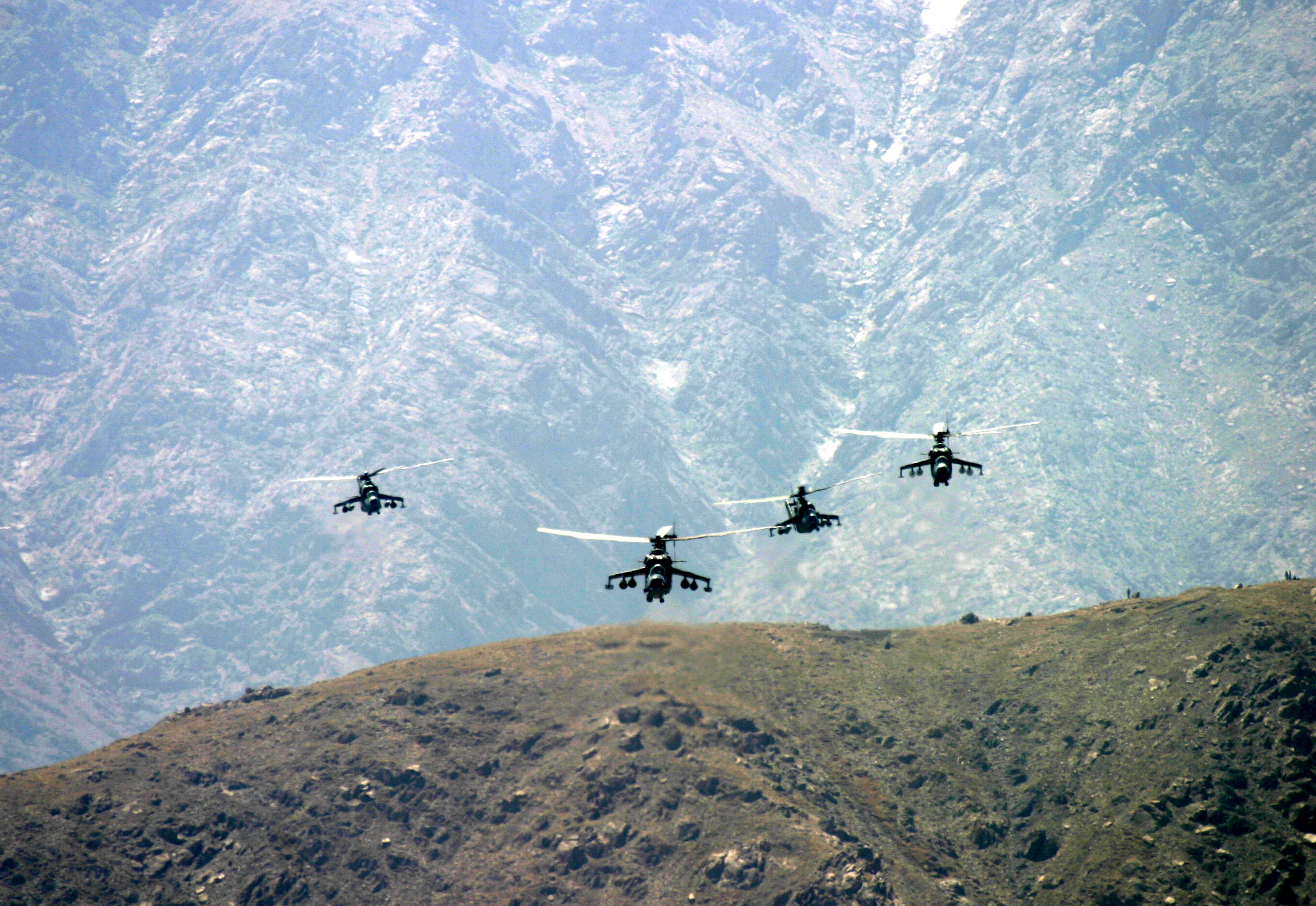 attack helis flying over mountains kabul