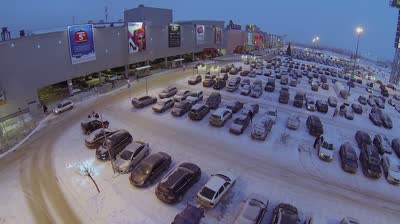 samara large car parking near trade center mega at winter evening aerial